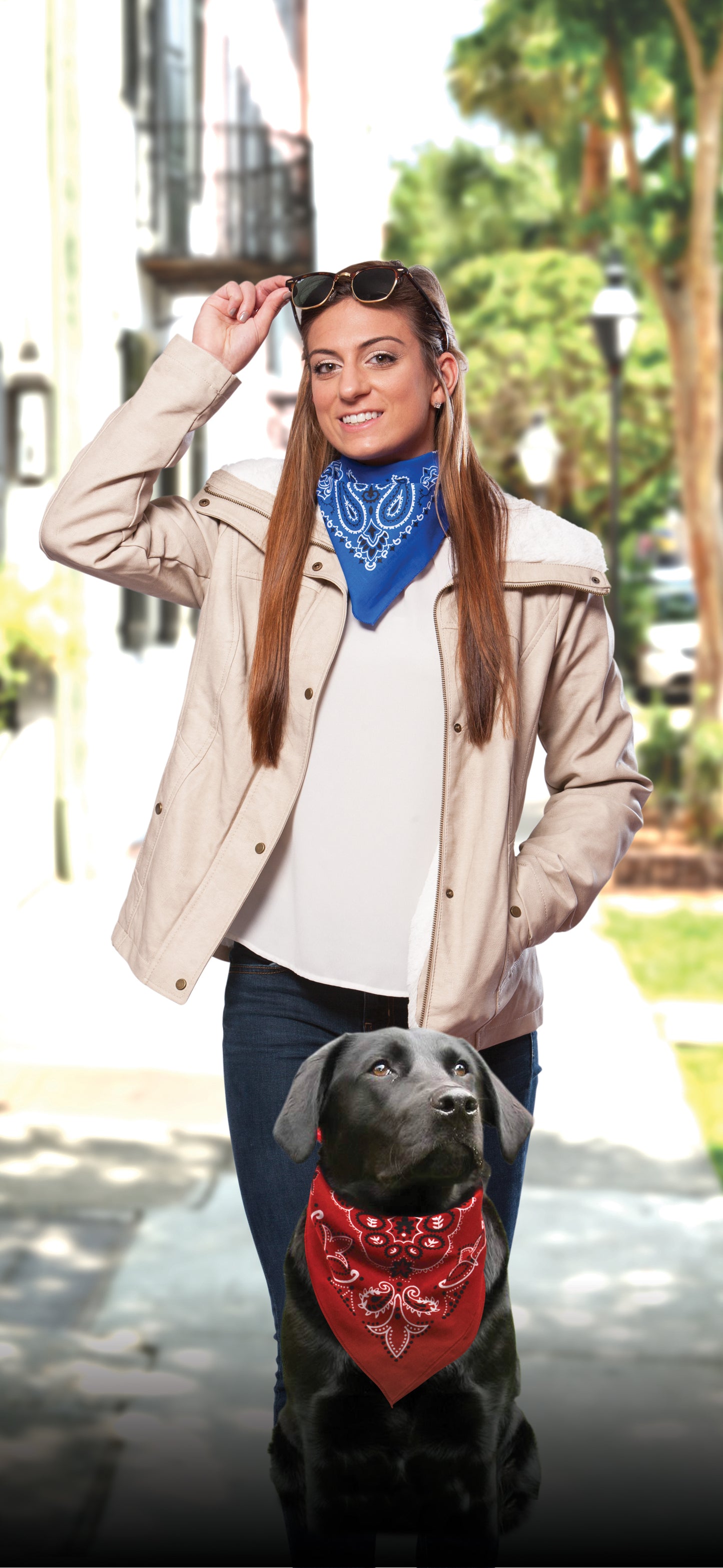 Woman wearing blue bandanna and dog with Red Paisley Bandanna 4 Pack - Cotton 22x22 outdoors.
