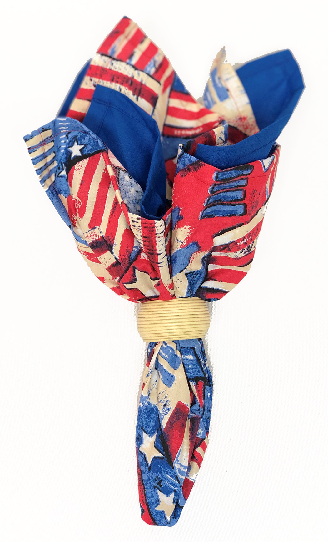 Patriotic-themed bandanna decorated with American flag patterns, tied with a yellow band, showcasing red, blue, and beige colors.
