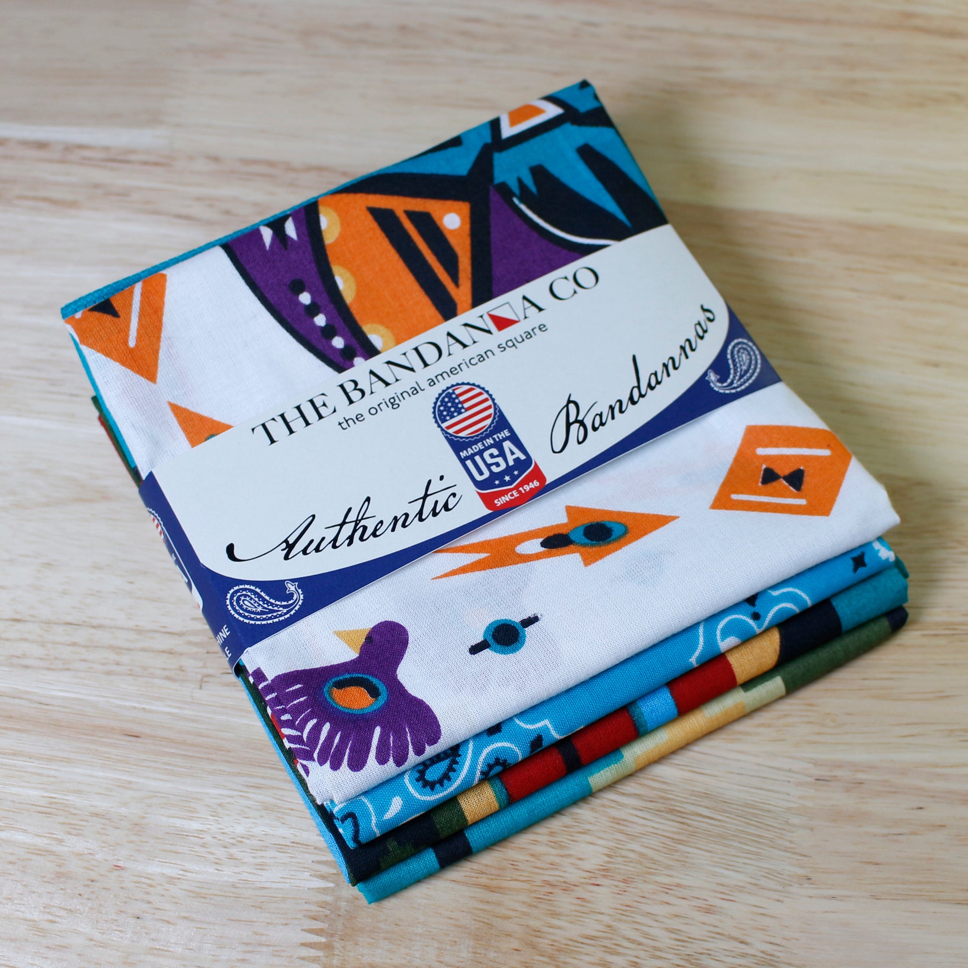 Desert Jewel Bandanna Assortment 4-Pack - Made In The USA displayed with colorful designs and logo on packaging.