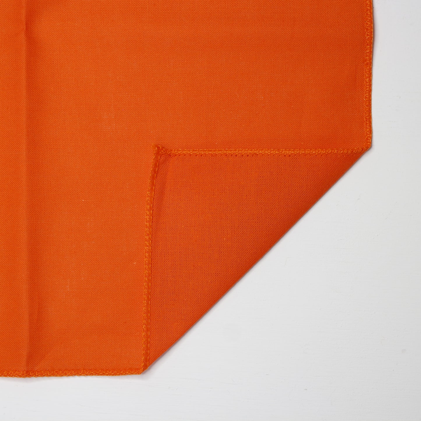 Orange Solid Color Bandanna 4 Pack - Cotton 22x22 showing folded corner detail on white background.