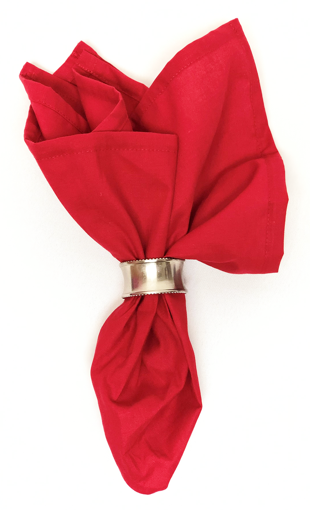 SOLID COLOR 22" BANDANNAS - 12 Pack in red, folded and adorned with a silver napkin ring.
