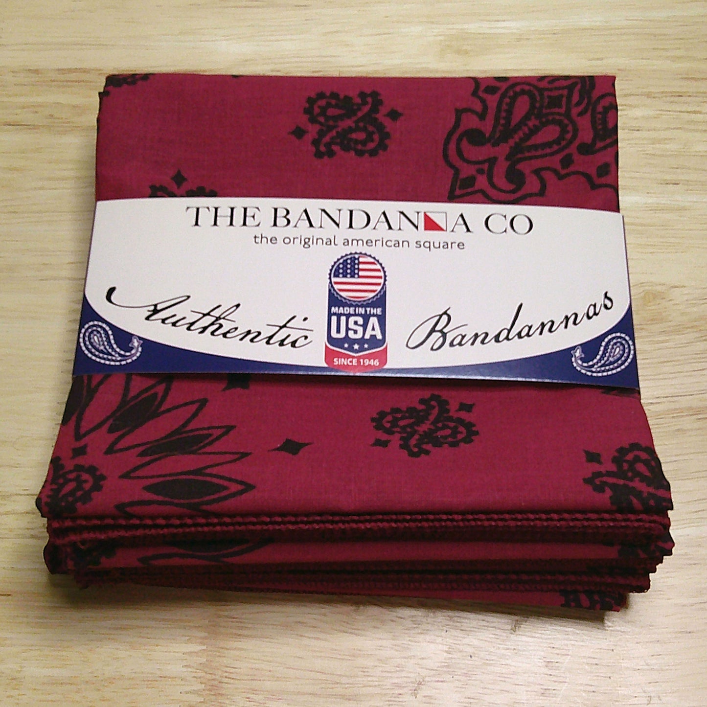 Contemporary Paisley Bandannas - 4-Pack featuring red design, made in the USA, 100% cotton, 22x22 inches, with rolled hem edges.