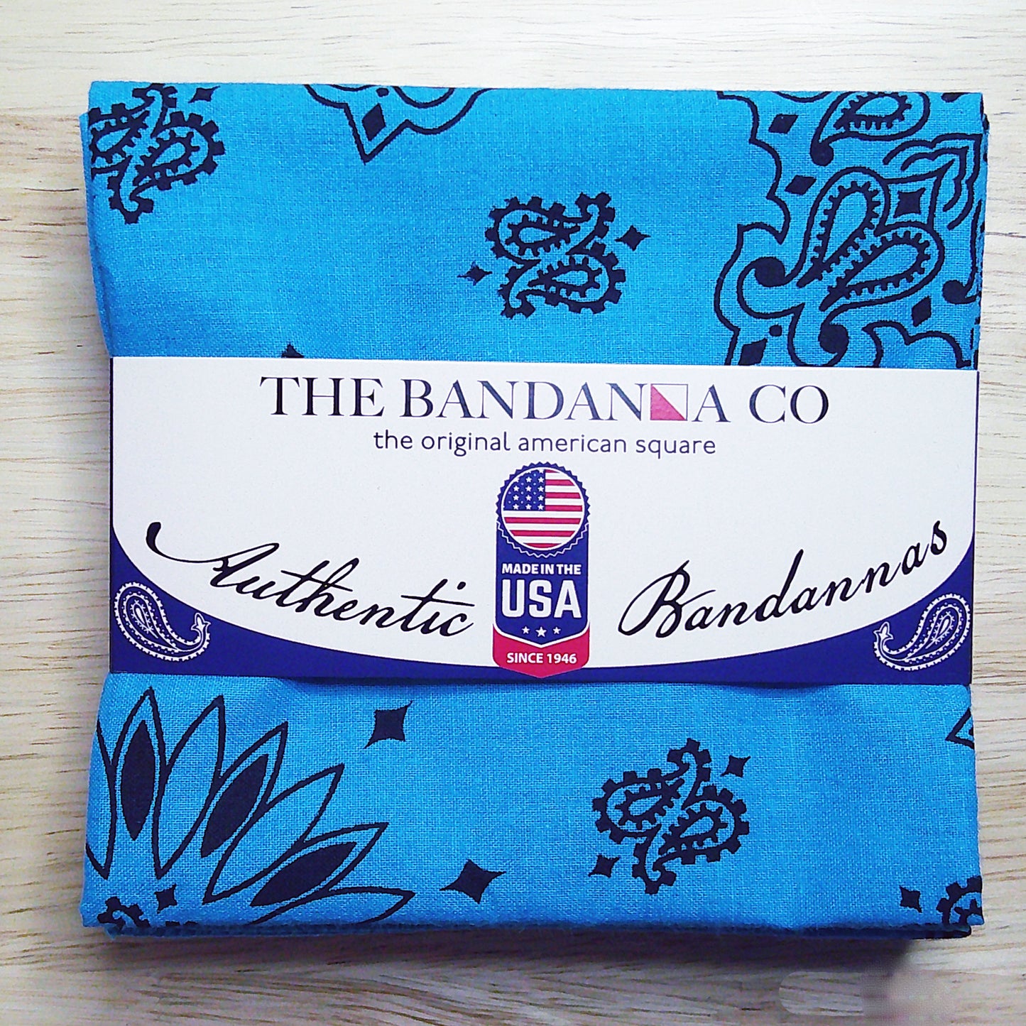 Contemporary Paisley Bandannas - 4-Pack, made in the USA, featuring blue rolled hem edges and true two-sided print on 100% cotton fabric.