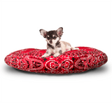SMALL DOG ON RED PAISLEY PET BED